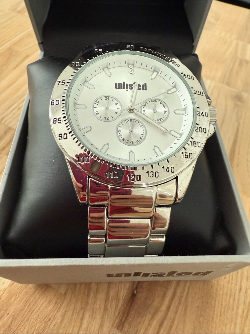 Unlisted by Kenneth Cole mend silver tone watch NEW BATTERY